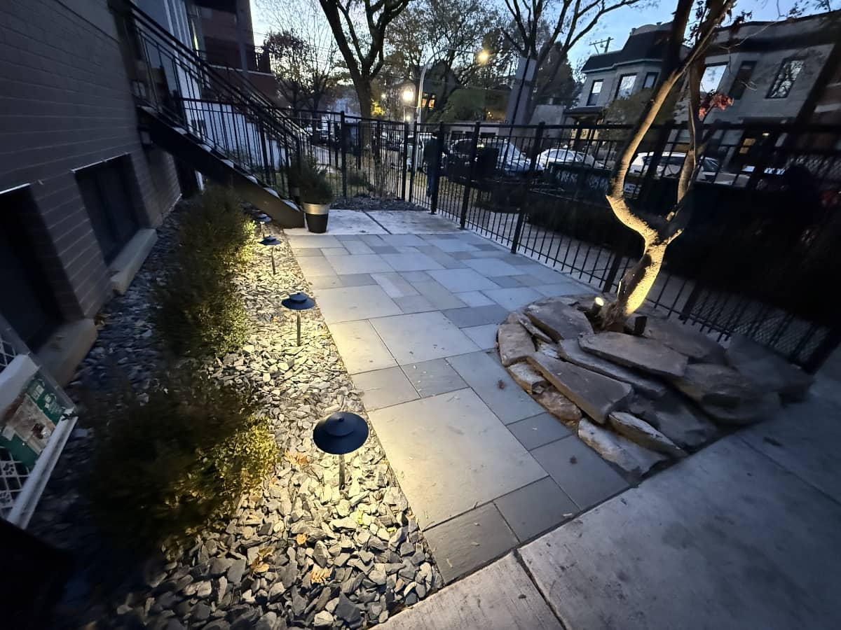 front yard patio with landscaping work done