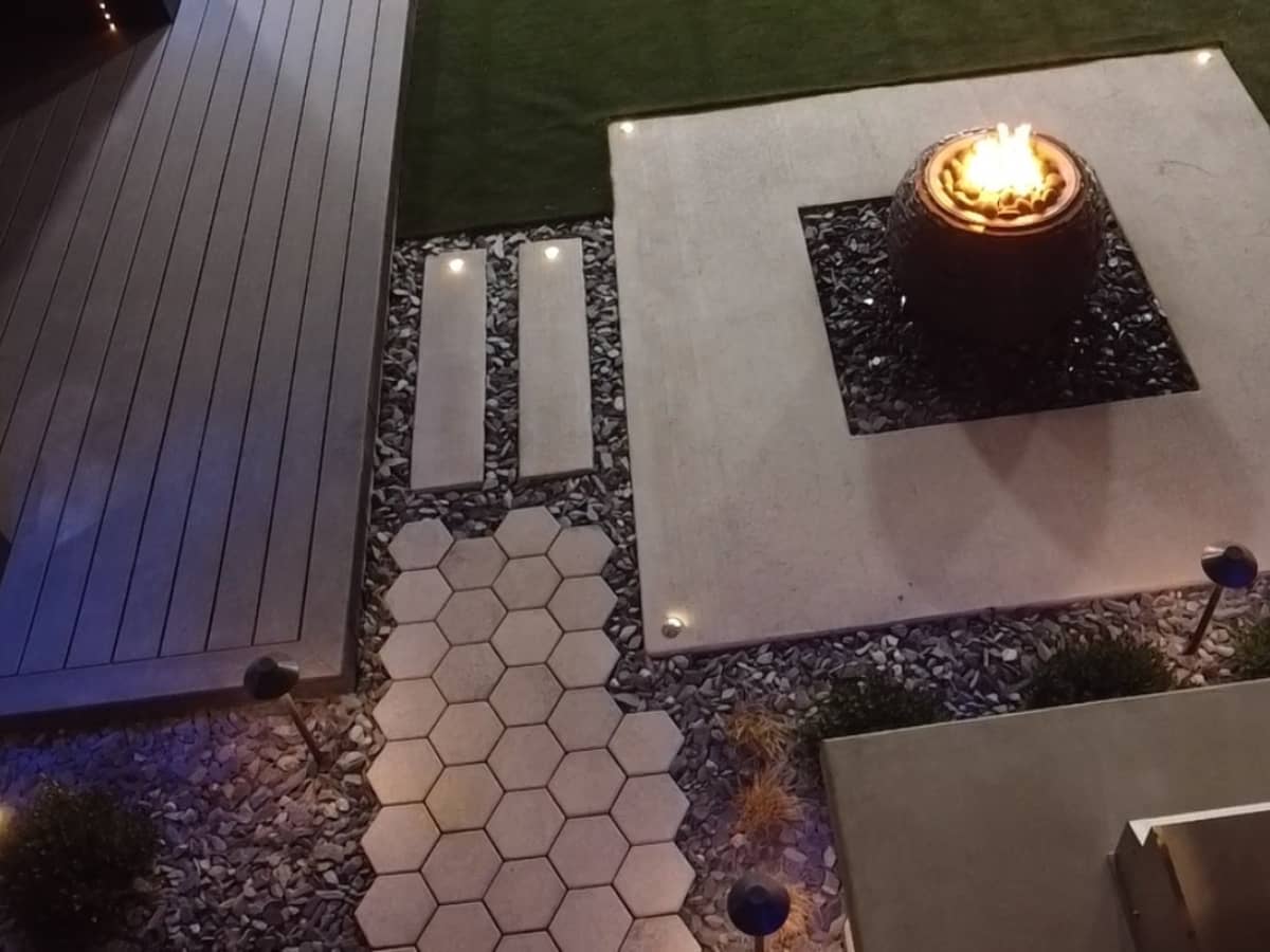 fireplace along with new turf and patio