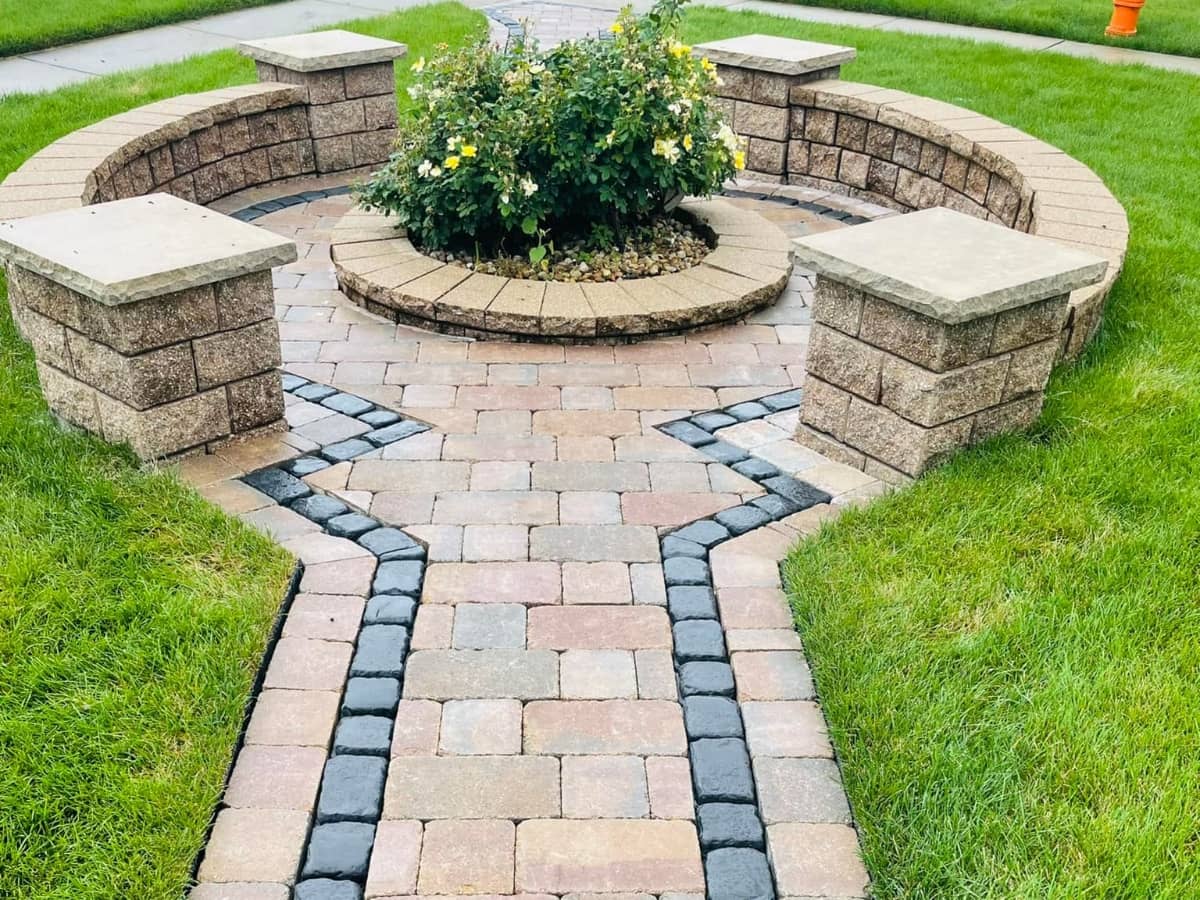 beautiful walkway leading up to middle of the yard