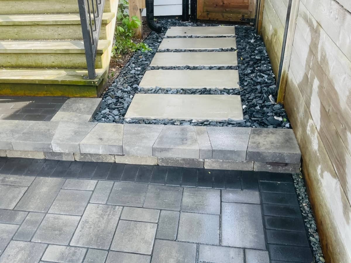 paver walkway with flagstone steps and crushed slate gravel