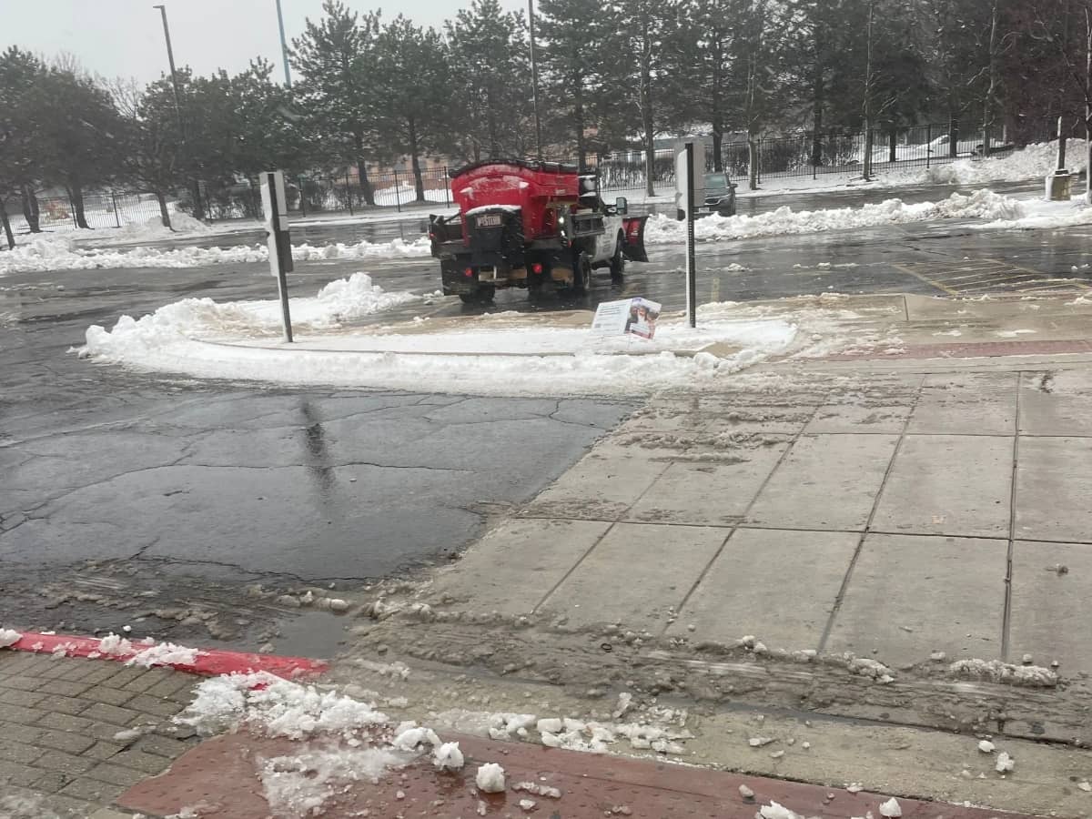 snow plowing a large lot