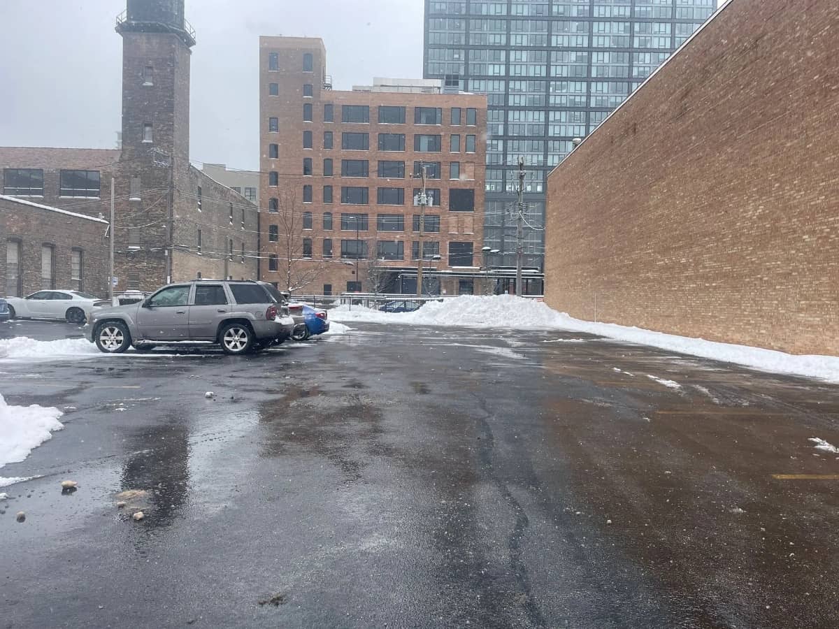 snow removal for large parking lot with company truck