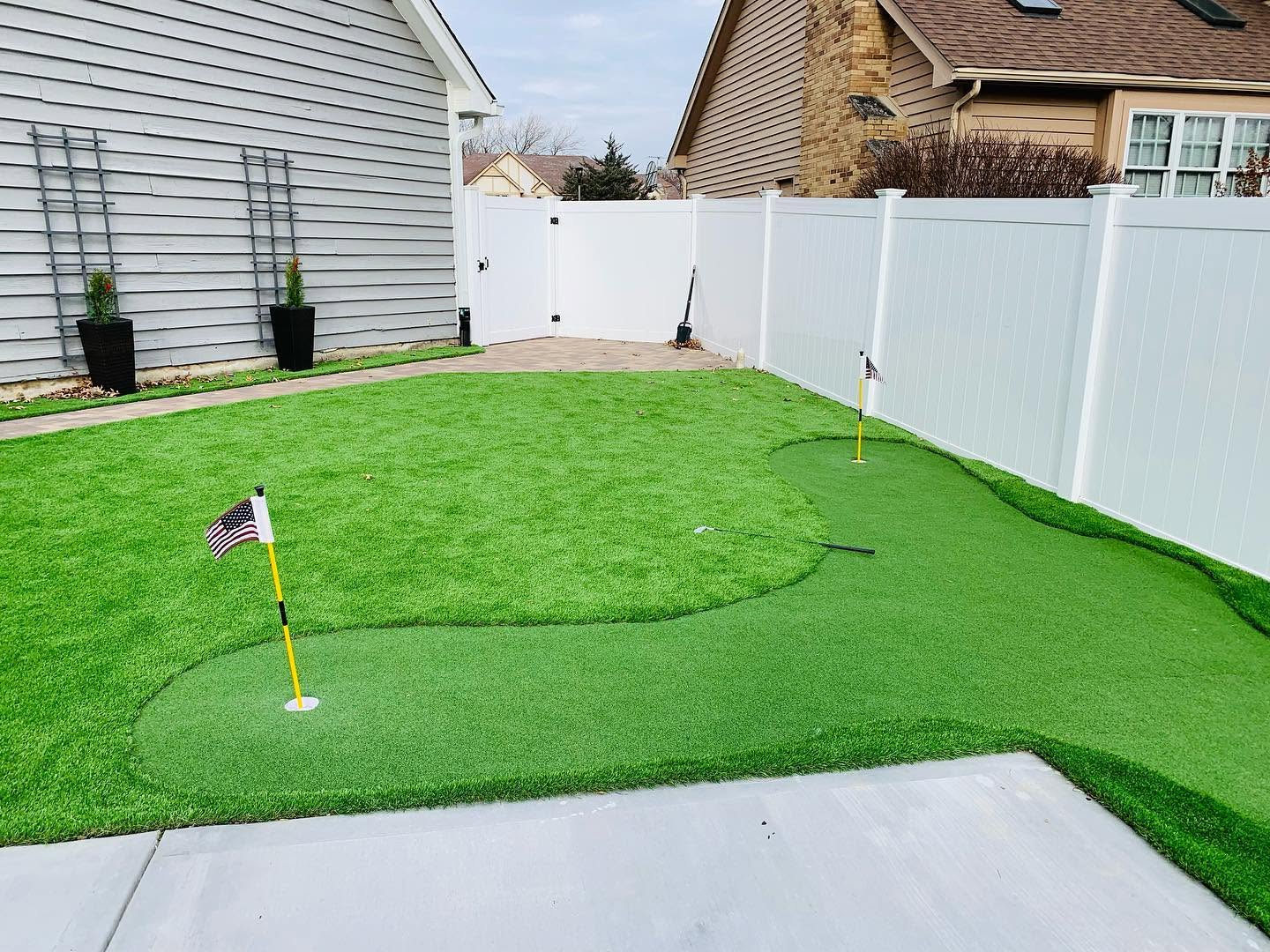 putting green with two holes
